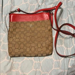 Tan and red coach crossbody